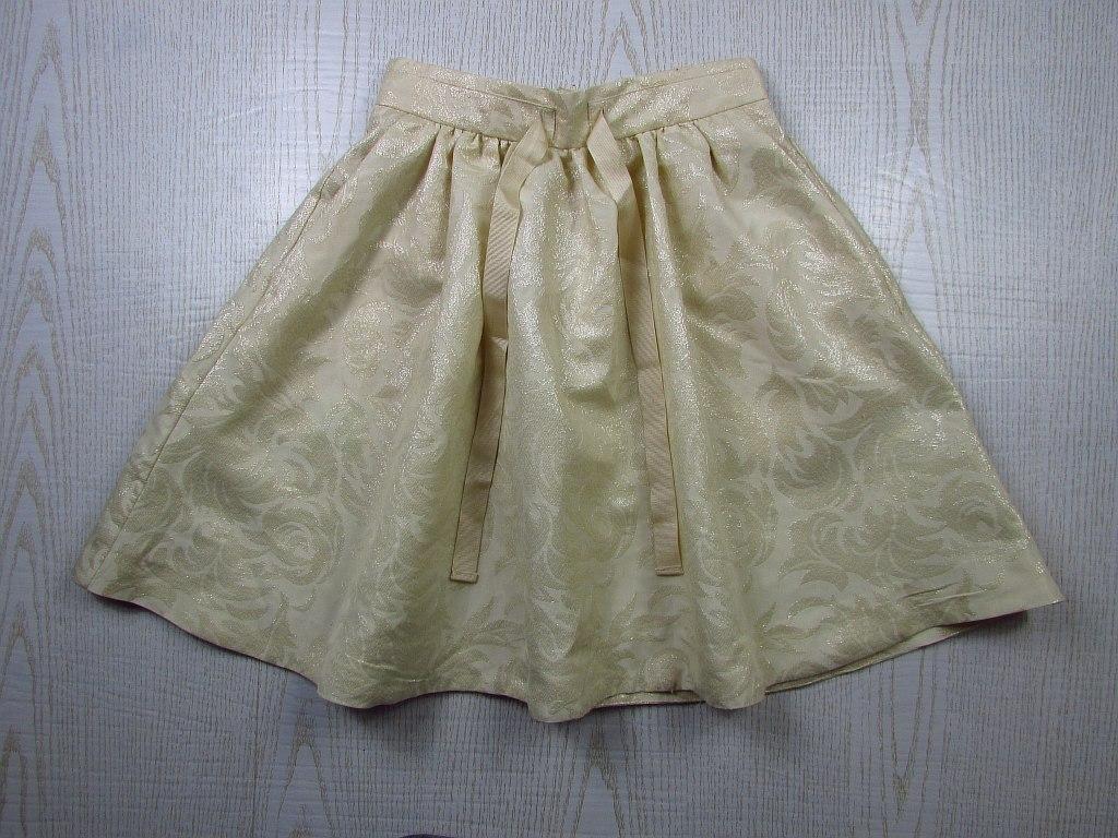 картинка Красивая нарядная юбка из плотной ткани с блеском от интернет-магазина детской и женской одежды секонд хенд, а также товаров для женщин и детей Odewashka.by